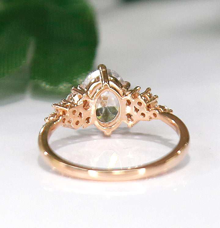 Oval White Topaz Cluster Anniversary Ring in 14K Rose Gold Finish